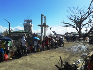 Thousands still waited in line at the Tacloban Airport on the ninth day following the typhoon